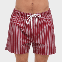 Maroon and white striped swim shorts on a plain background