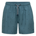 Teal swim shorts with small patterns on a white background