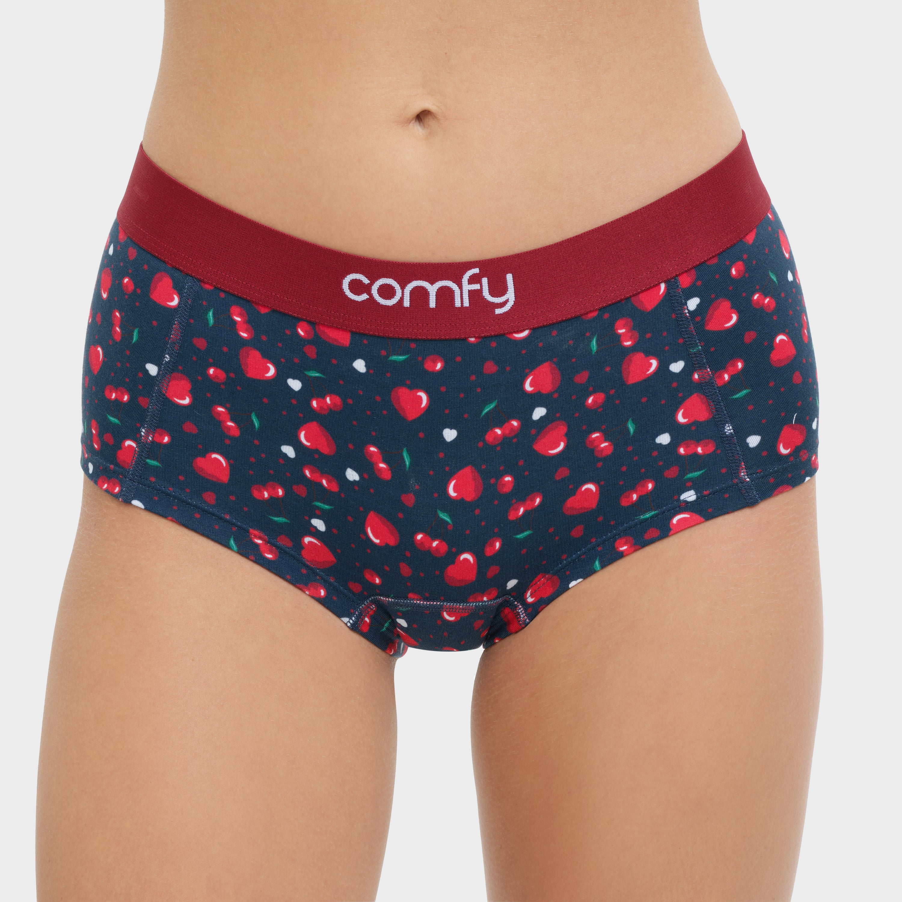 Navy underwear with red strawberry pattern and red waistband on a white background