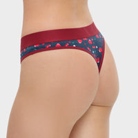 Patterned underwear with red waistband on a plain background
