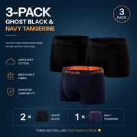 fit:regular | qty:1x | menge:1x | A 3-pack promotional graphic for Comfort Balls men's boxer briefs, featuring two ghost black styles and one navy tangerine style. The image includes descriptive text highlighting the super soft cotton, breathable fabric, and signature comfort fit, along with a pack quantity badge and a color breakdown at the bottom.