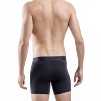 fit:long | qty:1x | menge:1x | Rear view of a man wearing black Pols sports boxer briefs against a white background.