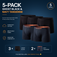 fit:long | qty:1x | menge:1x | A 5-pack promotional graphic for men's boxer briefs in Ghost Black and Navy Tangerine. The image shows five pairs of underwear arranged together, with three in black and two in navy blue, each featuring a bright orange inner waistband and the 'comfyballs' brand name printed on the front.