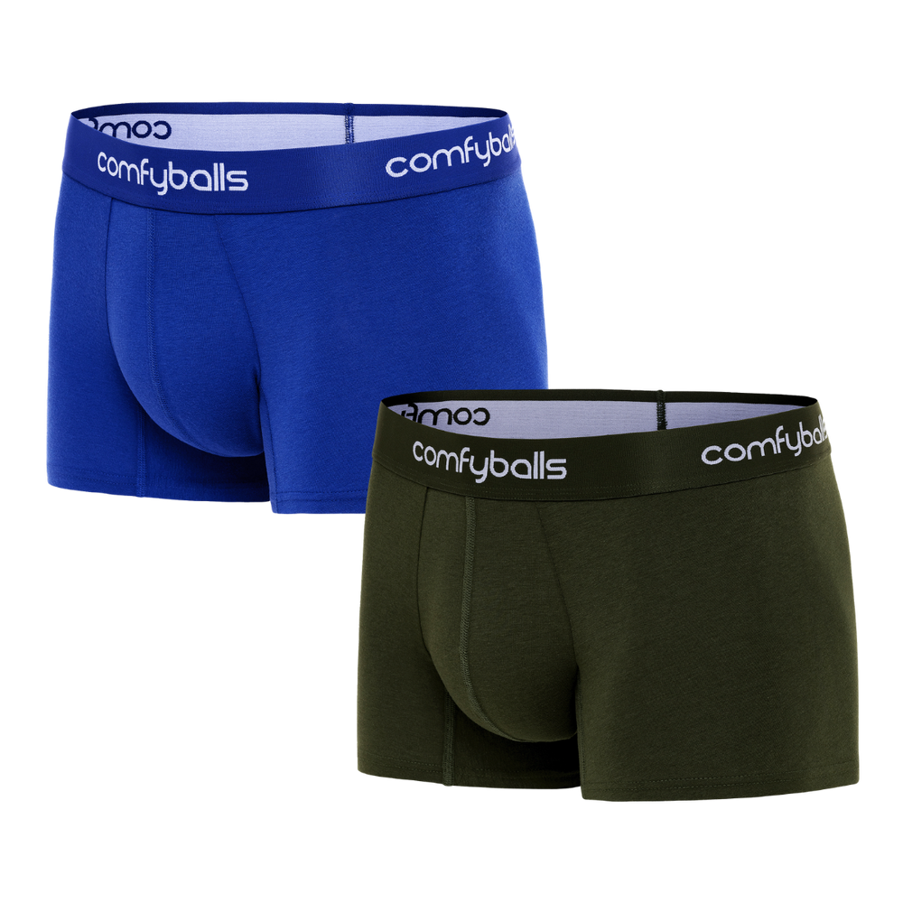 fit:regular | qty:1x | menge:1x | Two pairs of Comfyballs Comfycel men's REGULAR length boxer briefs, one green and one blue, displayed against a solid white background.