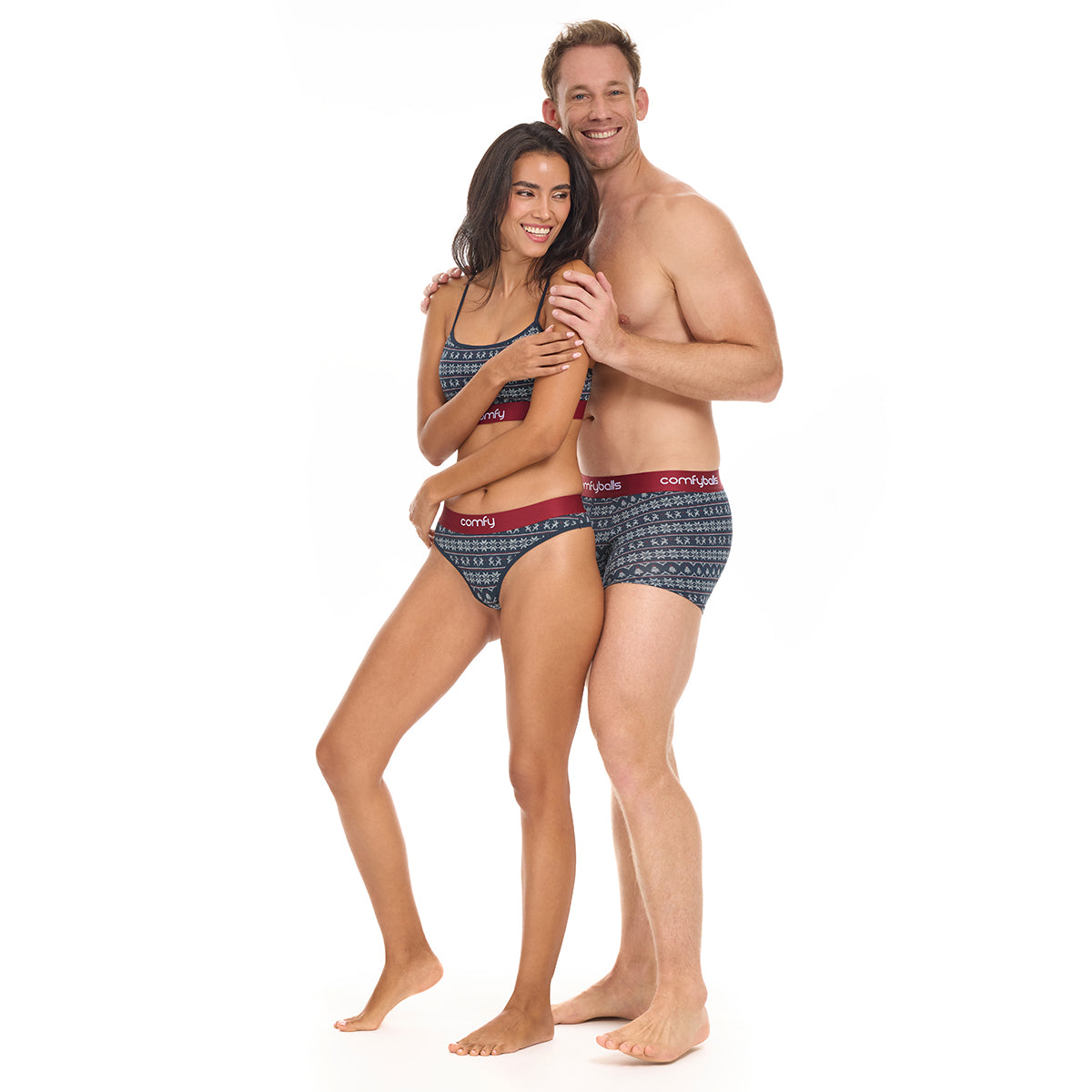 Man and woman wearing matching underwear on a white background