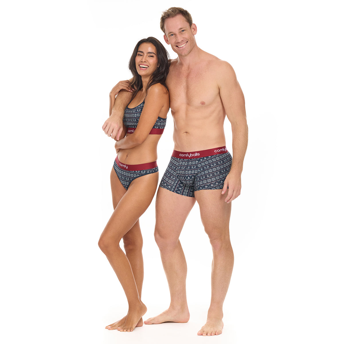 Man and woman wearing patterned underwear on a white background