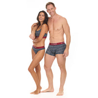 Man and woman wearing patterned underwear on a white background