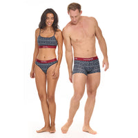 Man and woman wearing matching underwear on a white background
